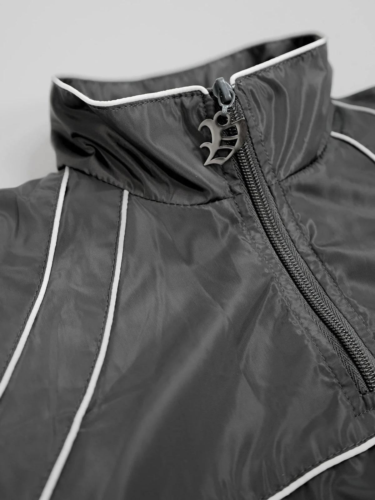 “RADIANT AURA” NYLON TRACK JACKET (SHADOW GREY)