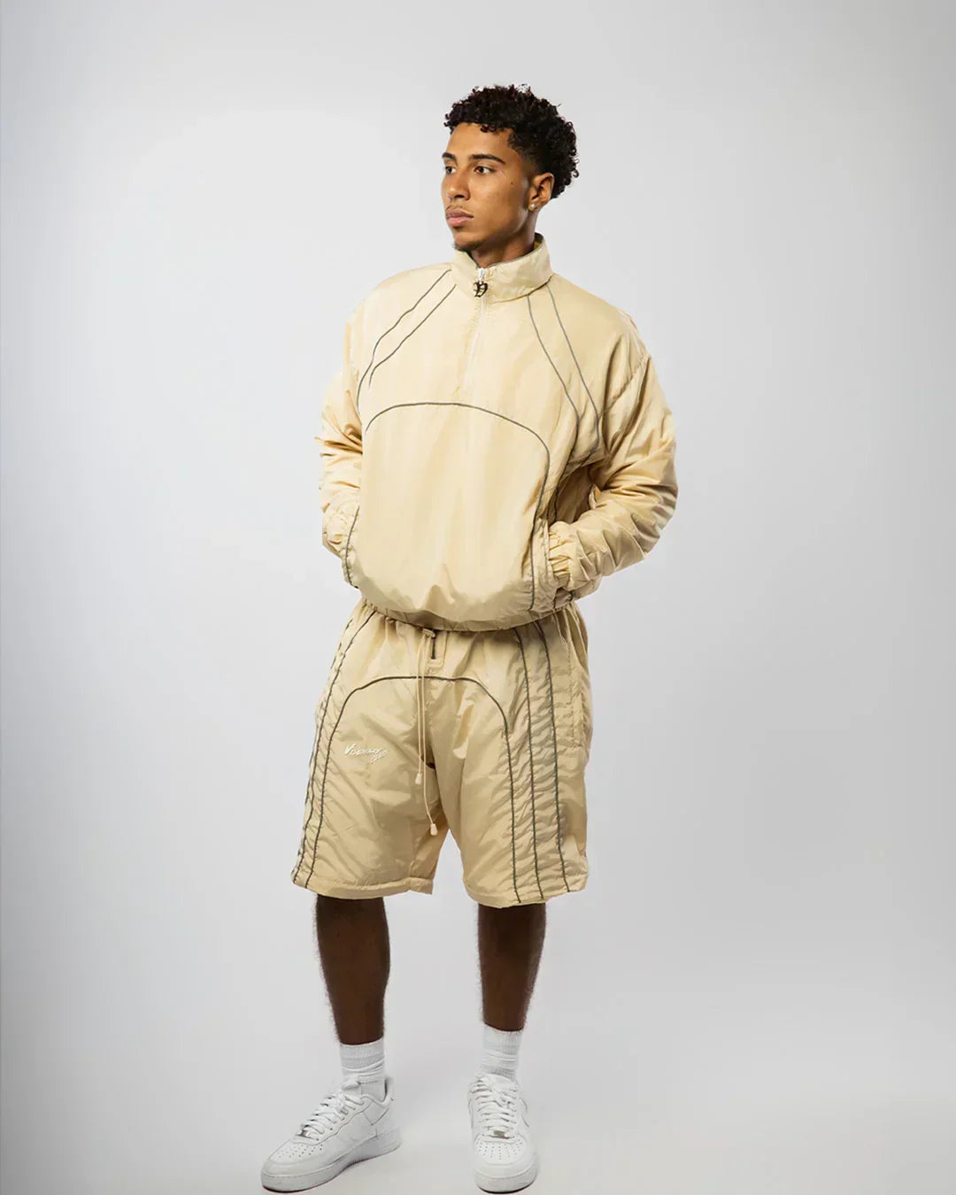“RADIANT AURA” NYLON TRACK JACKET (SAND)