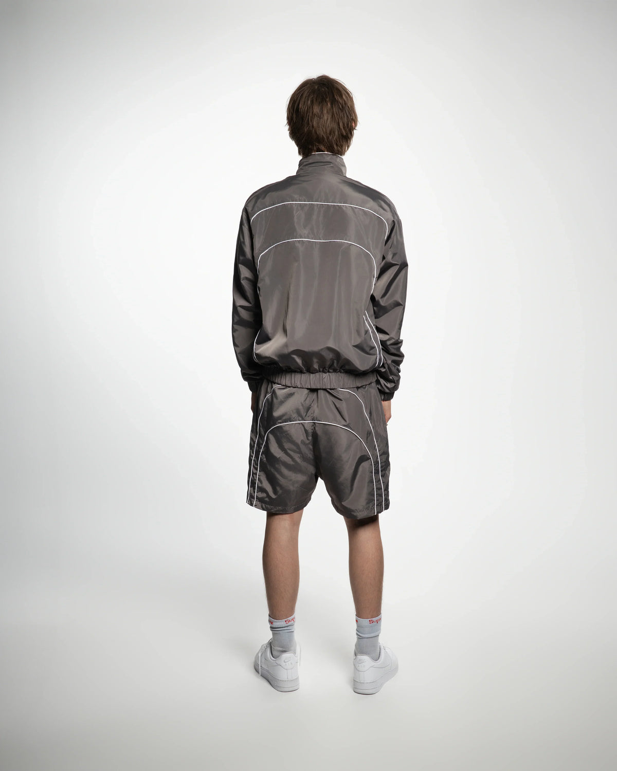 “RADIANT AURA” NYLON TRACK JACKET (SHADOW GREY)