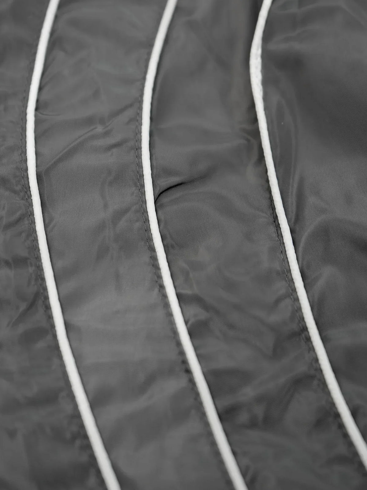 “RADIANT AURA” NYLON TRACK JACKET (SHADOW GREY)