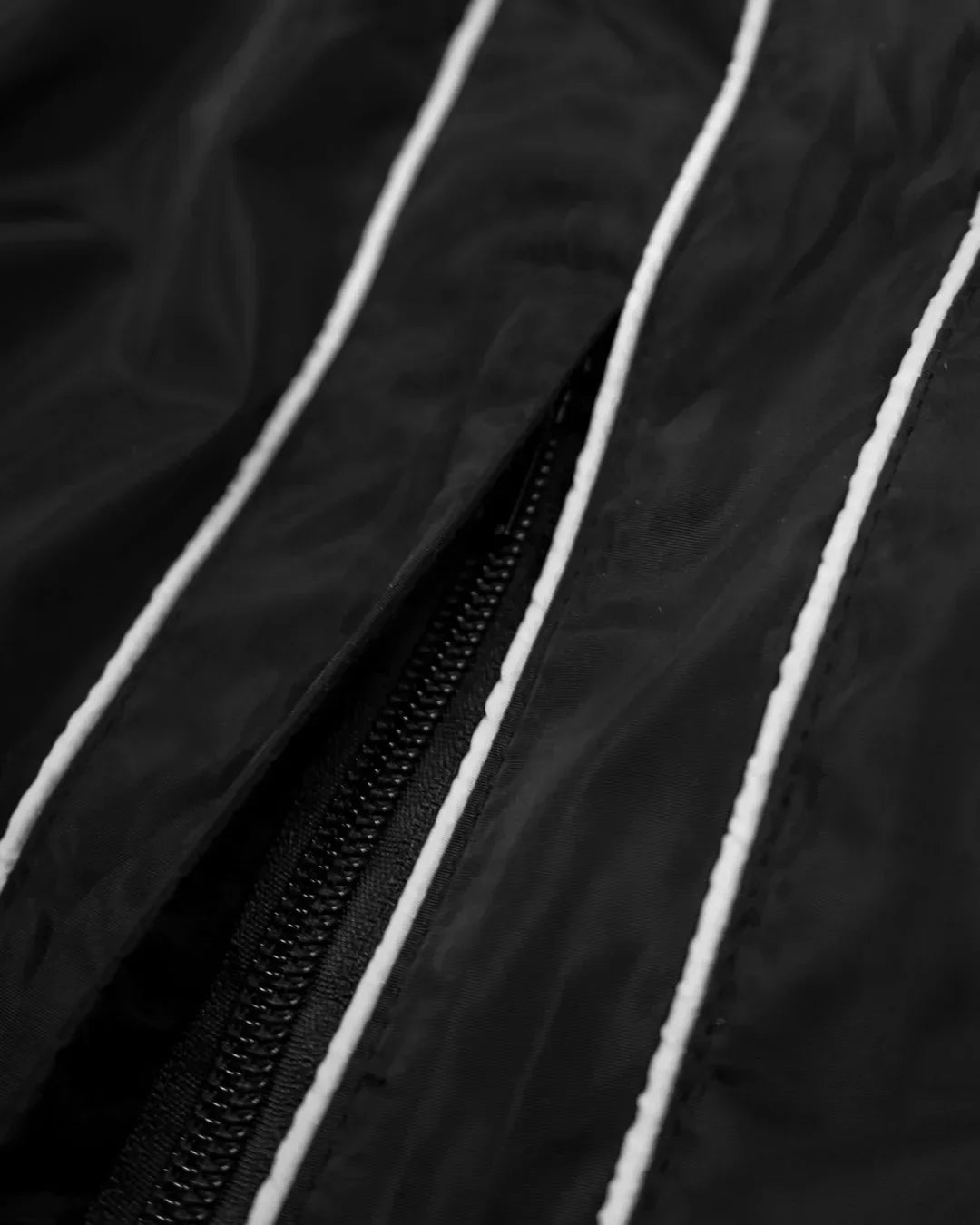 “RADIANT AURA” NYLON TRACK JACKET (NIGHT PULSE)