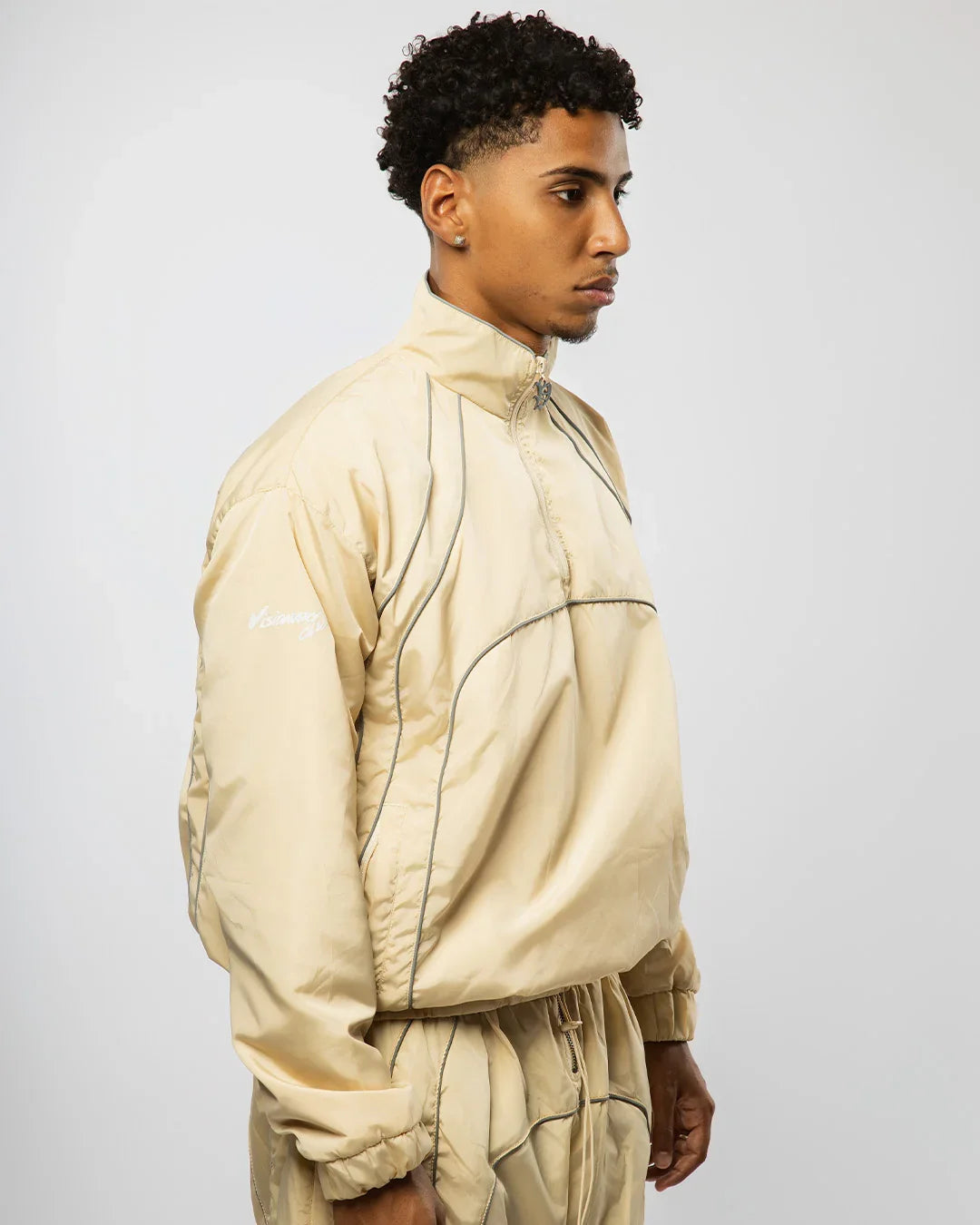 RADIANT らんくん 値下げ交渉可能　fakeleather blouson RADIANT AURA” NYLON TRACK JACKET (SAND) – Visionary Club